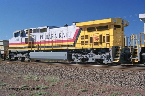 248-05
Dingo Siding on the Hamersley Iron railway at the 39 km with an empty train headed up by a pair of General Electric built Dash 9-44CW units 9408 serial 54158 from the fourth order in 2003 wearing the Pilbara Rail livery with Robe ownership markings. Approximate [url=https://goo.gl/maps/Jv752bD5KXv28oUV7]location[/url]. April 24, 2004.
Keywords: 9408;GE;Dash-9-44CW;54158;