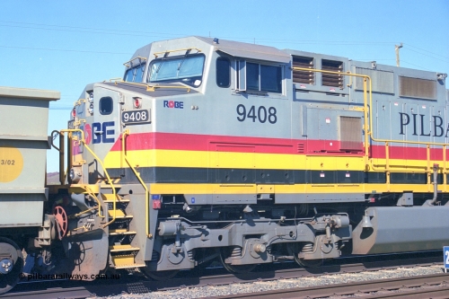 248-07
Dingo Siding on the Hamersley Iron railway at the 39 km with an empty train headed up by a pair of General Electric built Dash 9-44CW units 9408 serial 54158 from the fourth order in 2003 wearing the Pilbara Rail livery with Robe ownership markings. Approximate [url=https://goo.gl/maps/Jv752bD5KXv28oUV7]location[/url]. April 24, 2004.
Keywords: 9408;GE;Dash-9-44CW;54158;