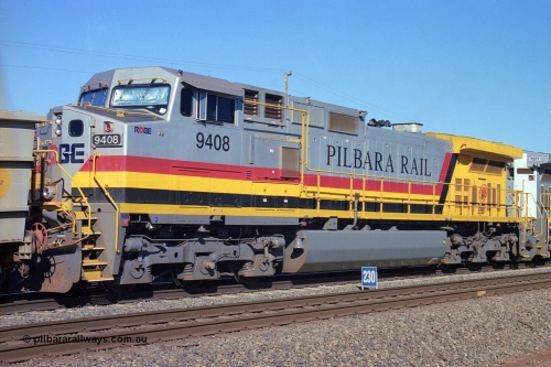 248-10
Dingo Siding on the Hamersley Iron railway at the 39 km with an empty train headed up by a pair of General Electric built Dash 9-44CW units 9408 serial 54158 from the fourth order in 2003 wearing the Pilbara Rail livery with Robe ownership markings. The blue 230 sign is the indication that there is 230 waggons in clear at that point. Approximate [url=https://goo.gl/maps/Jv752bD5KXv28oUV7]location[/url]. April 24, 2004.
Keywords: 9408;GE;Dash-9-44CW;54158;