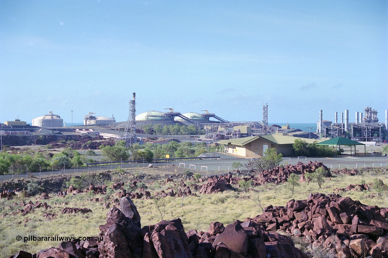 249-37
Burrup Peninsula gas plant, view of storage tanks, plant and visitors centre. Approximate [url=https://goo.gl/maps/VnJ1jpgZBkq1ZPtR7]location[/url]. 18th December 1999.
