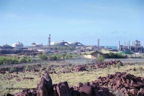 249-37
Burrup Peninsula gas plant, view of storage tanks, plant and visitors centre. Approximate [url=https://goo.gl/maps/VnJ1jpgZBkq1ZPtR7]location[/url]. 18th December 1999.
