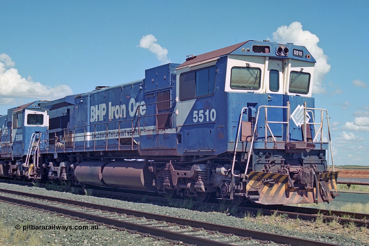 251-01
Nelson Point, BHP's recently retired Goninan WA ALCo C636 to GE C36-7M rebuild unit 5510 awaits its fate. Rebuilt in 1987 at Goninan's Welshpool factory from 1969 AE Goodwin built ALCo C636 with serial number G6027-2 and road number 5458 and assigned new serial number 4839-07 / 87-075. It was delivered in Mt Newman Mining orange and was named Newman. It received Dash 8 radiators following collision damage in 1993. 22nd April 2000.
Keywords: 5510;Goninan;GE;C36-7M;4839-07/87-075;rebuild;AE-Goodwin;ALCO;C636;5458;G6027-2;