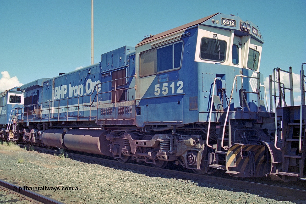 251-04
Nelson Point, BHP's recently retired Goninan WA ALCo C636 to GE C36-7M rebuild unit 5512 awaits its fate. Rebuilt in 1988 at Goninan's Welshpool factory from 1970 AE Goodwin built ALCo C636 with serial number G6041-1 and road number 5465 and assigned new serial number 4839-01 / 88-077. It was delivered in Mt Newman Mining orange and was named Hesta. 22nd April 2000.
Keywords: 5512;Goninan;GE;C36-7M;4839-01/88-077;rebuild'AE-Goodwin;ALCo;C636;5465;G6041-1;