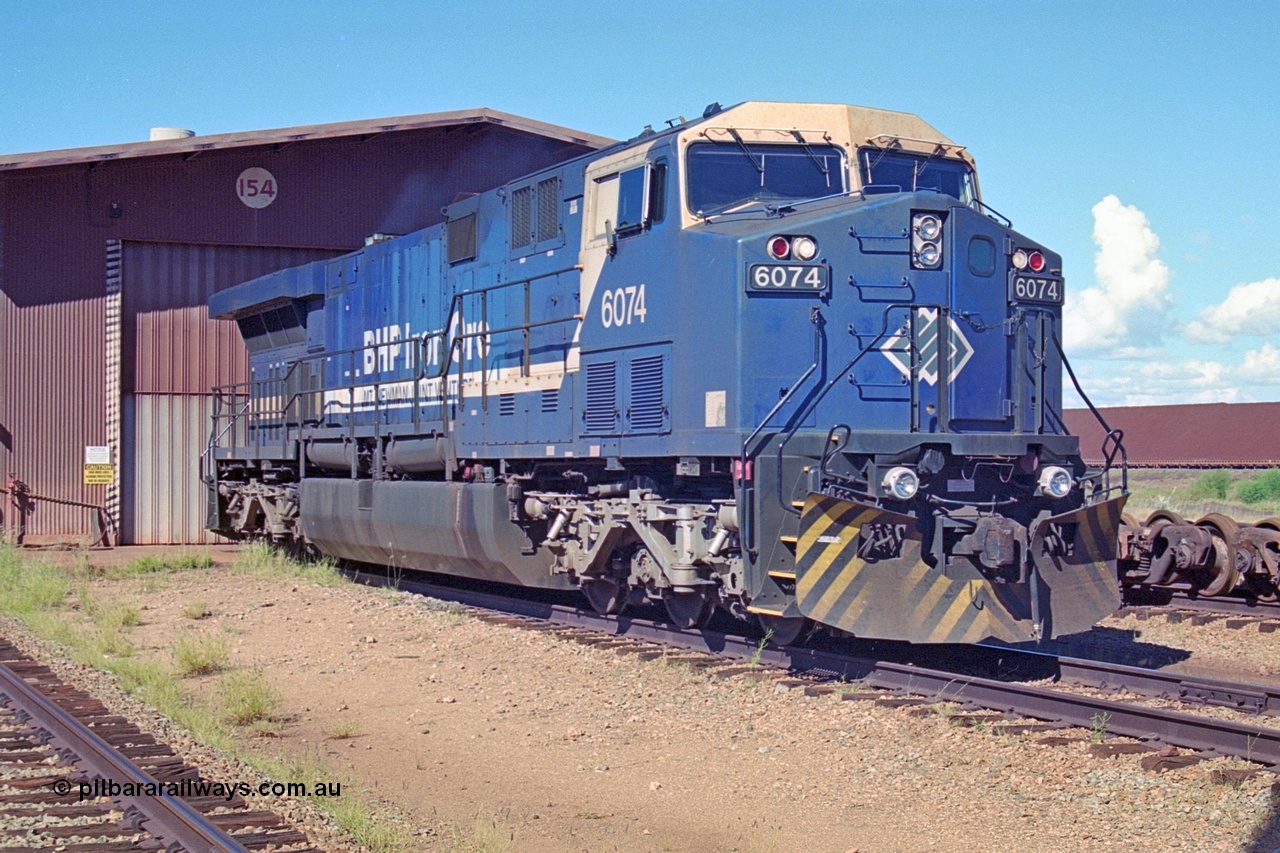 251-18
Nelson Point wheel lathe, BHP's General Electric built AC6000 model 6074 serial 51066 and yet to be named idles away outside the shop. 22nd April 2000.
Keywords: 6074;GE;AC6000;51066;