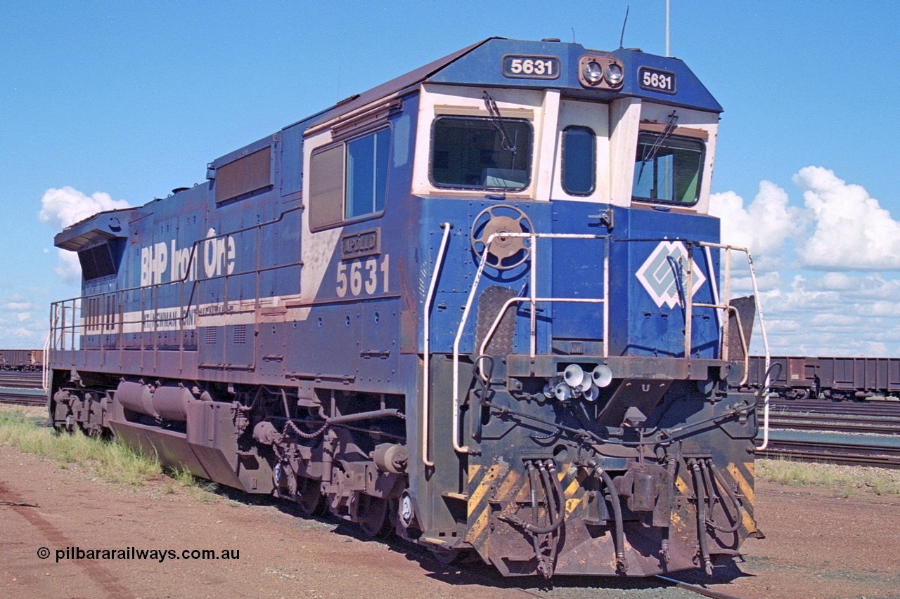 251-23
Nelson Point hard stand area, BHP's 5631 'Apollo' built new in October 1988 by Goninan as a GE CM39-8 model with serial number 5831-10 / 88-080. One of four such units built in 1988 and delivered in the Mt Newman orange livery. 22nd April 2000.
Keywords: 5631;Goninan;GE;CM39-8;5831-10/88-080;