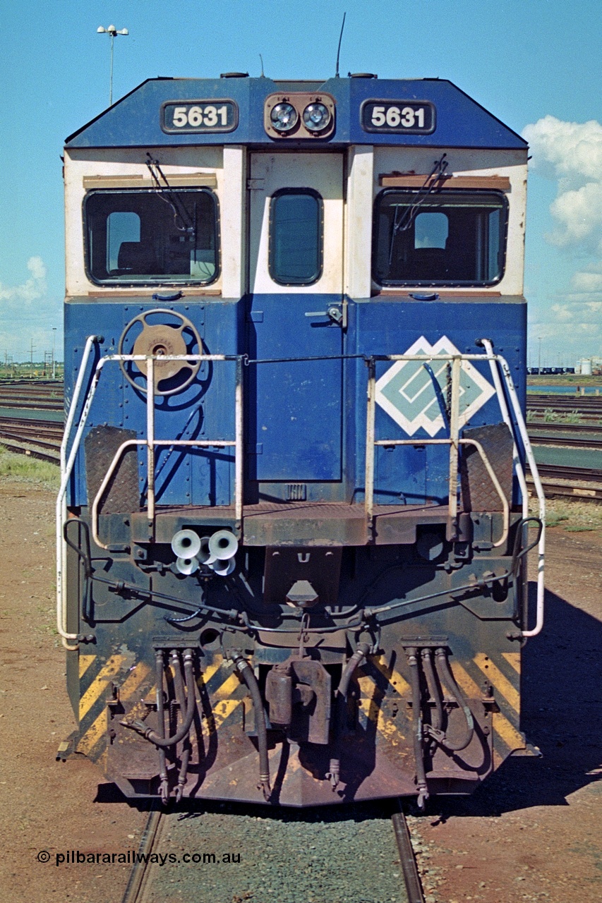 251-25
Nelson Point hard stand area, BHP's 5631 'Apollo' built new in October 1988 by Goninan as a GE CM39-8 model with serial number 5831-10 / 88-080. One of four such units built in 1988 and delivered in the Mt Newman orange livery. 22nd April 2000.
Keywords: 5631;Goninan;GE;CM39-8;5831-10/88-080;