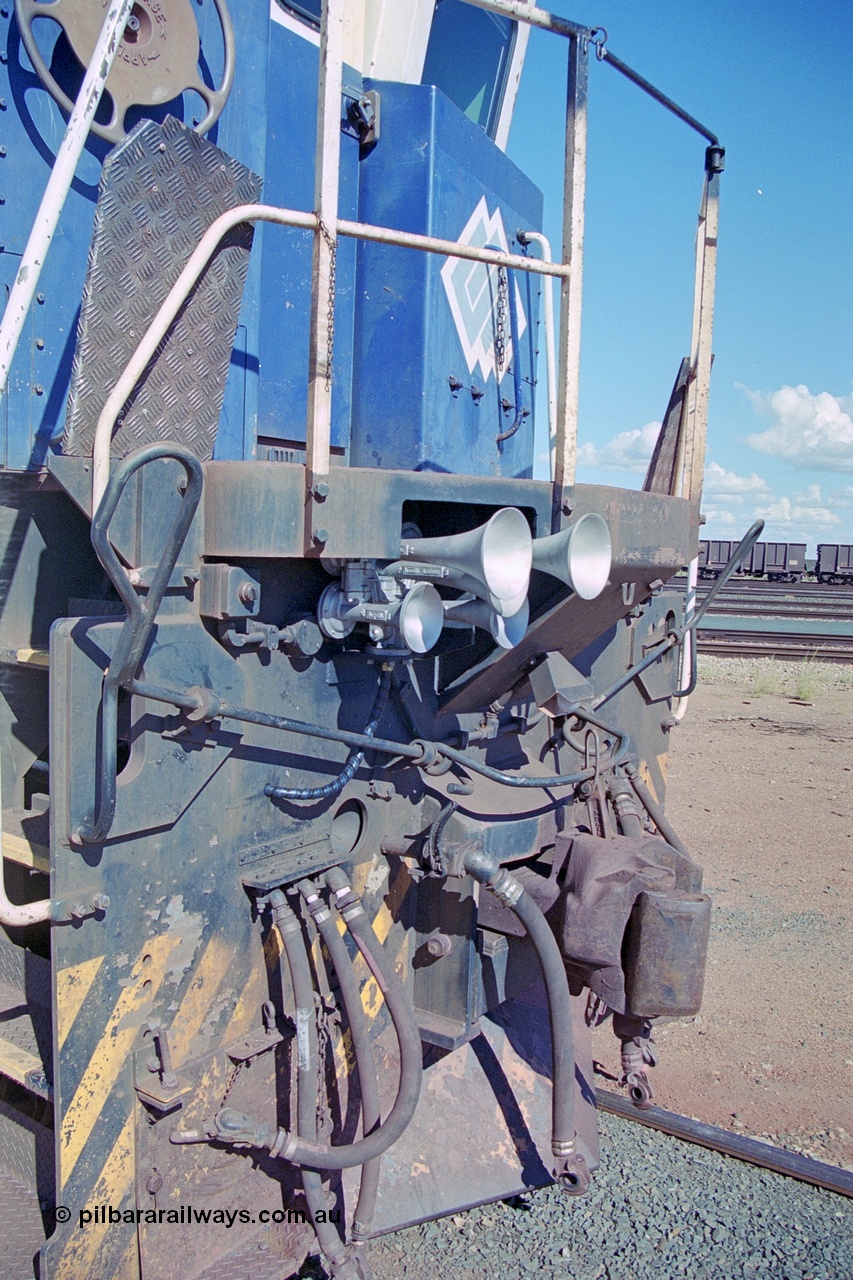 251-26
Nelson Point hard stand area, view of the pilot and newly installed Leslie 5 chime horn, the original single horn can be seen below it. BHP's 5631 'Apollo' built new in October 1988 by Goninan as a GE CM39-8 model with serial number 5831-10 / 88-080. One of four such units built in 1988 and delivered in the Mt Newman orange livery. 22nd April 2000.
Keywords: 5631;Goninan;GE;CM39-8;5831-10/88-080;