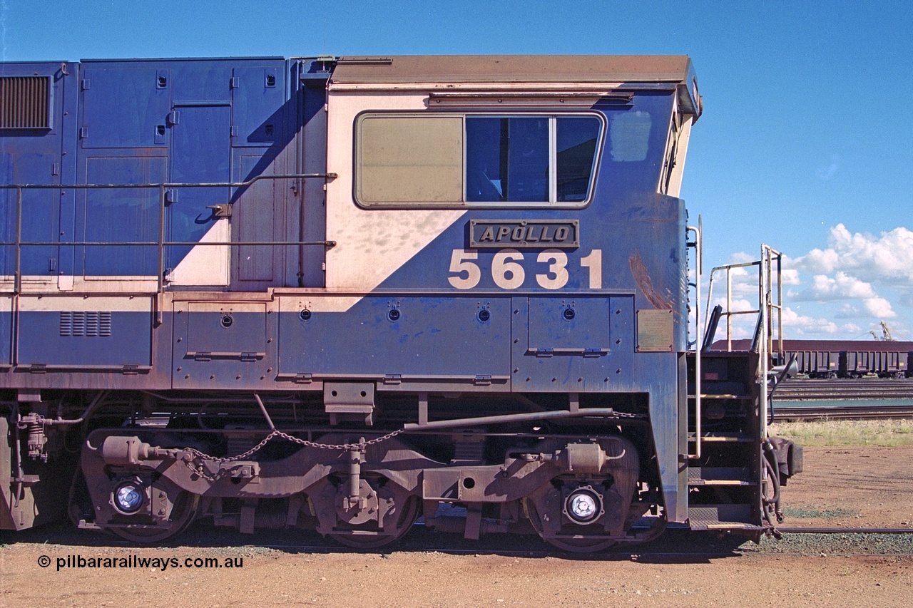 251-27
Nelson Point hard stand area, drivers side cab view of BHP's 5631 'Apollo' built new in October 1988 by Goninan as a GE CM39-8 model with serial number 5831-10 / 88-080. One of four such units built in 1988 and delivered in the Mt Newman orange livery. 22nd April 2000.
Keywords: 5631;Goninan;GE;CM39-8;5831-10/88-080;