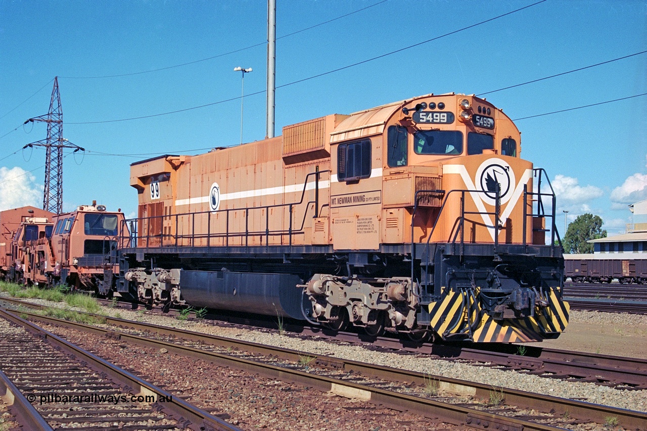 251-32
Nelson Point, the final ALCo on the BHP roster, 5499 sits stored pending its future. Built by Comeng NSW in November 1975 as an ALCo M636 with serial number C6096-04. The unit was intended to be donated to Thursday Island, but this didn't eventuate due to logistical reasons. It is now at the Rail Heritage WA museum in Bassendean. 22nd April 2000.
Keywords: 5499;Comeng-NSW;ALCo;M636;C6096-4;