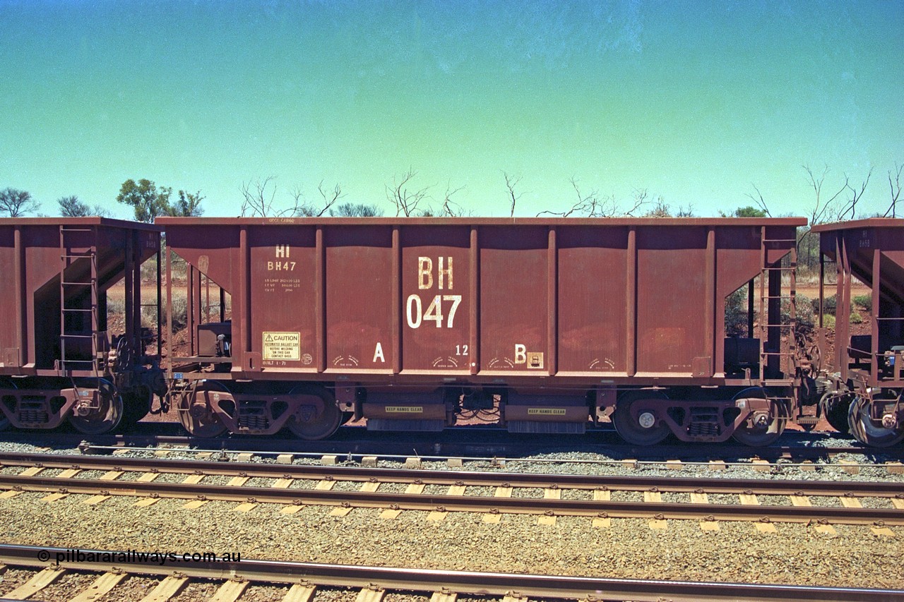 252-01
Cockatoo Siding 273 km on the Hamersley Iron line to Yandi, National Steel Car Company of Canada built ballast hopper waggon BH 047 built in January 1971. A batch of twenty were built for Hamersley Iron. Location is roughly [url=https://goo.gl/maps/gNdgoAj6uJoYb2q36]here[/url]. 24th November 2001.
Keywords: BH-type;BH047;National-Steel-Car-Canada;Rio-ballast-waggon;