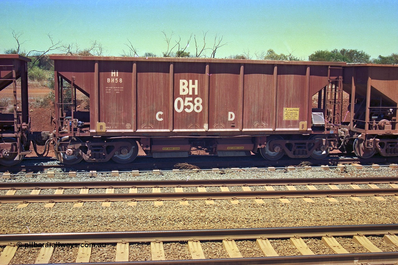 252-10
Cockatoo Siding 273 km on the Hamersley Iron line to Yandi, National Steel Car Company of Canada built ballast hopper waggon BH 058 built in January 1971. A batch of twenty were built for Hamersley Iron. Location is roughly [url=https://goo.gl/maps/gNdgoAj6uJoYb2q36]here[/url]. 24th November 2001.
Keywords: BH-type;BH058;National-Steel-Car-Canada;Rio-ballast-waggon;