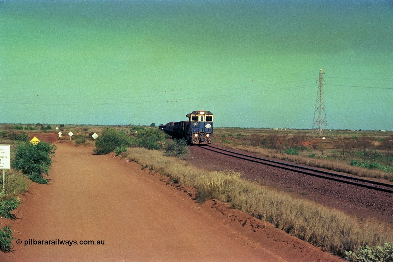 252-31
Port Hedland at 12 Mile Creek a loaded Yarrie train crosses over the creek behind Goninan CM40-8M GE rebuild unit 5645 'Sherlock' serial number 8281-11 / 92-134. Early December 2001.
Keywords: 5645;Goninan;GE;CM40-8M;8281-11/92-134;rebuild;AE-Goodwin;ALCo;M636C;5475;G6047-7;