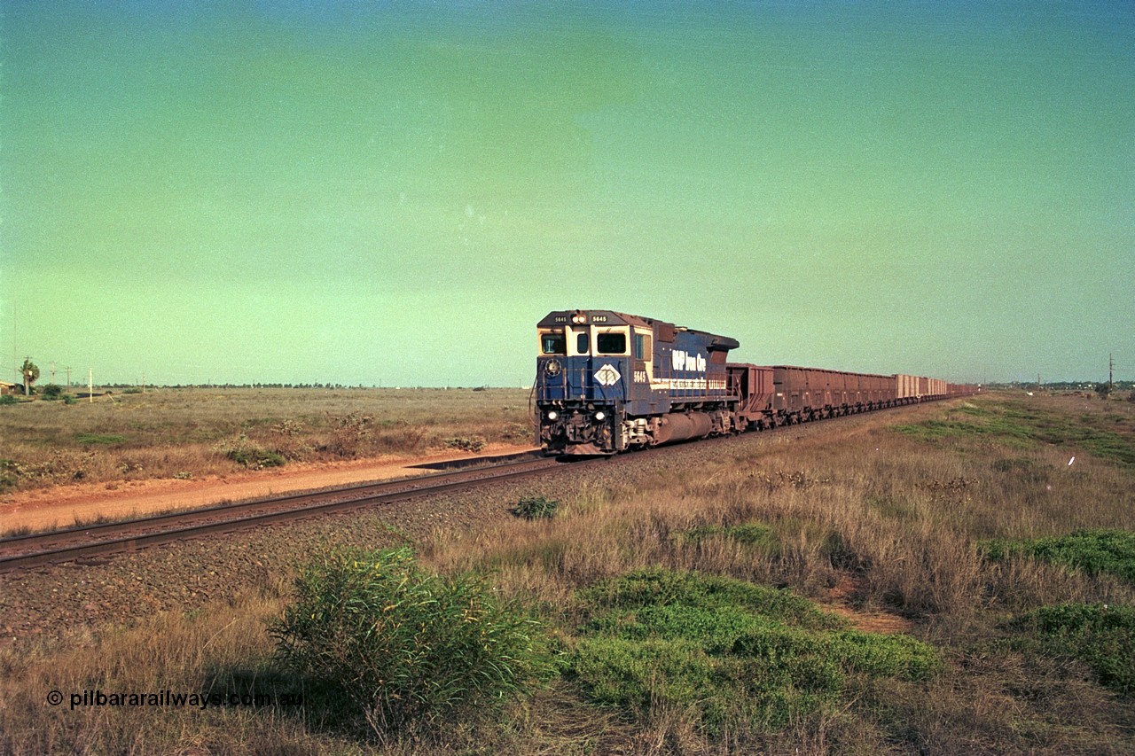 252-36
Boodarie, a loaded Yarrie train is crossing the Roebourne Rd at the 9.6 km behind Goninan CM40-8M GE rebuild unit 5645 'Sherlock' serial number 8281-11 / 92-134. Early December 2001.
Keywords: 5645;Goninan;GE;CM40-8M;8281-11/92-134;rebuild;AE-Goodwin;ALCo;M636C;5475;G6047-7;