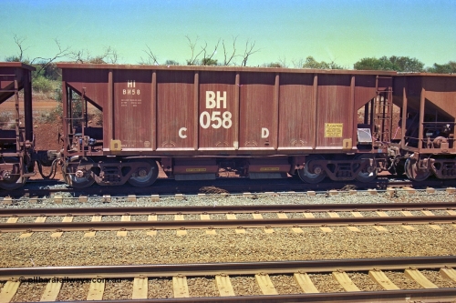 252-10
Cockatoo Siding 273 km on the Hamersley Iron line to Yandi, National Steel Car Company of Canada built ballast hopper waggon BH 058 built in January 1971. A batch of twenty were built for Hamersley Iron. Location is roughly [url=https://goo.gl/maps/gNdgoAj6uJoYb2q36]here[/url]. 24th November 2001.
Keywords: BH-type;BH058;National-Steel-Car-Canada;Rio-ballast-waggon;