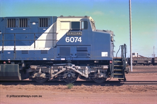 252-22
Nelson Point cab side view of BHP Iron Ore's General Electric built AC6000 unit 6074 'Kalgan' serial number 51066 is shutdown near the wheel lathe. Early December 2001.
Keywords: 6074;GE;AC6000CW;51066;