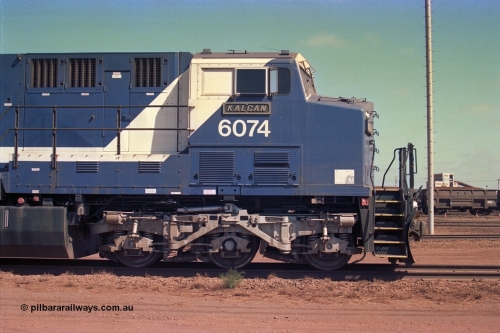 252-23
Nelson Point cab side view of BHP Iron Ore's General Electric built AC6000 unit 6074 'Kalgan' serial number 51066 is shutdown near the wheel lathe. Early December 2001.
Keywords: 6074;GE;AC6000CW;51066;