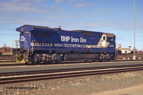 253-31
Nelson Point yard sees BHP dumper pilot locomotive 5666 'Taranto', a Goninan GE rebuild CM40-8MEFI model with serial 8412-11 / 94-157, 5666 was the first unit fitted with Electronic Fuel Injection to the 16FDL engine hence the EFI on the model designation.
Keywords: 5666;Goninan;GE;CM40-8MEFI;8412-11/94-157;rebuild;Comeng-NSW;ALCo;M636C;5487;C6084-3;