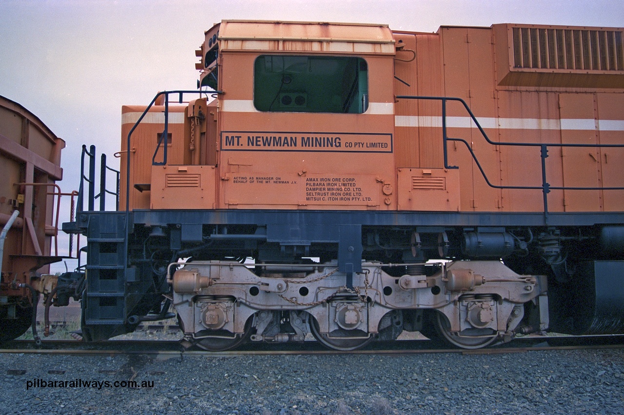 254-18
Flash Butt yard, stored Mt Newman Mining 5499 was the last active ALCo on the BHP roster. Cab side shows ownership details and bogie. Built in November 1975 by Comeng NSW as an ALCo M636 model with serial number C6065-4. Unit was donated to Rail Heritage WA in 2001.
Keywords: 5499;Comeng-NSW;ALCo;M636;C6096-4;