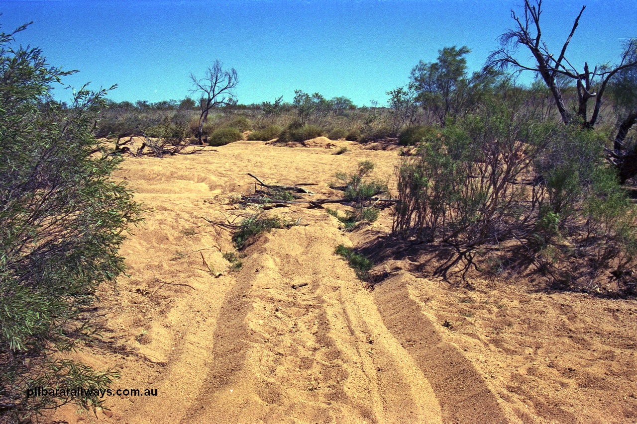 254-28
Enroute to the former Stannum Mine, bogged in a tributary of the Yule River, looking west. GeoData [url=https://goo.gl/maps/xLxgetgysbD45Nhy8]location here[/url]. September 2001. September 2001.
