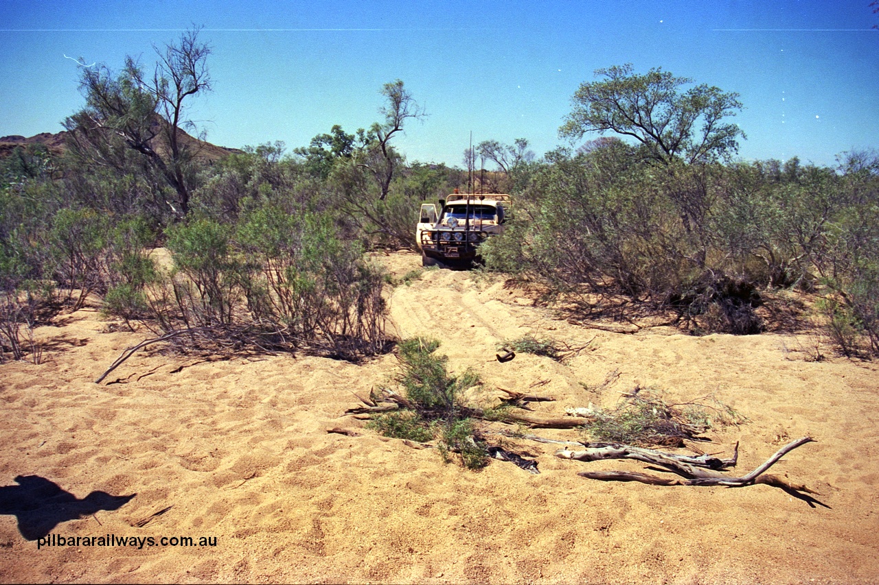 254-29
Enroute to the former Stannum Mine, bogged in a tributary of the Yule River, looking east, the way we came in. GeoData [url=https://goo.gl/maps/xLxgetgysbD45Nhy8]location here[/url]. September 2001.
