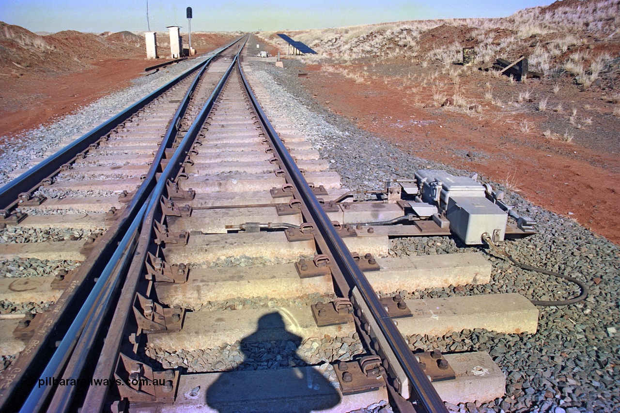 255-08
Siding Three, swing nose point machine on the south end points riding on concrete sleepers at the 134.7 km. May 2002.
