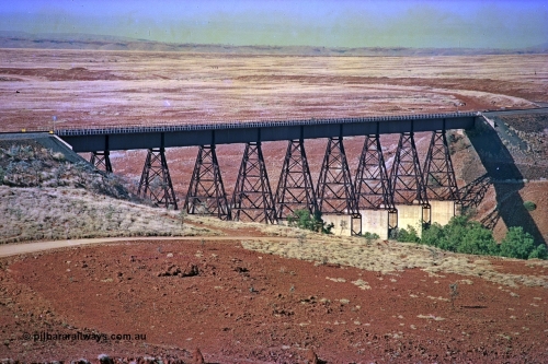 255-02
Fortescue River bridge on the Robe River Cape Lambert to Deepdale line at the 115.8 km looking south. Geodata [url=https://goo.gl/maps/FESXZ7bkPCQmeWhZ8]location here[/url]. May 2002.
