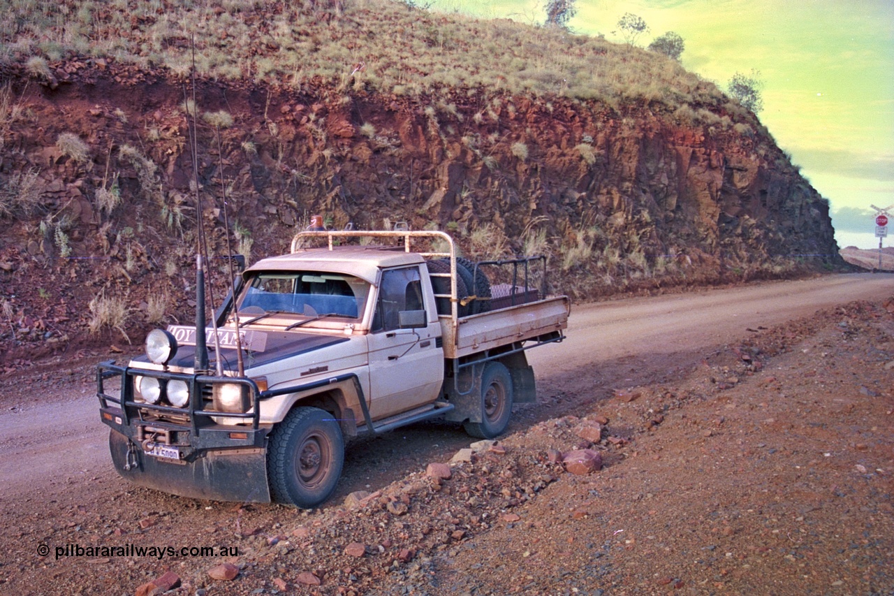 256-14
89.6 km, Toyota Landcruiser HJ75, waiting for a train. May 2002.
