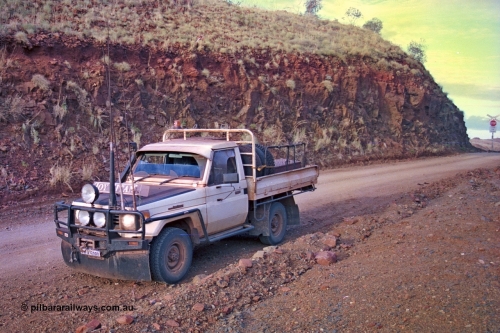256-14
89.6 km, Toyota Landcruiser HJ75, waiting for a train. May 2002.
