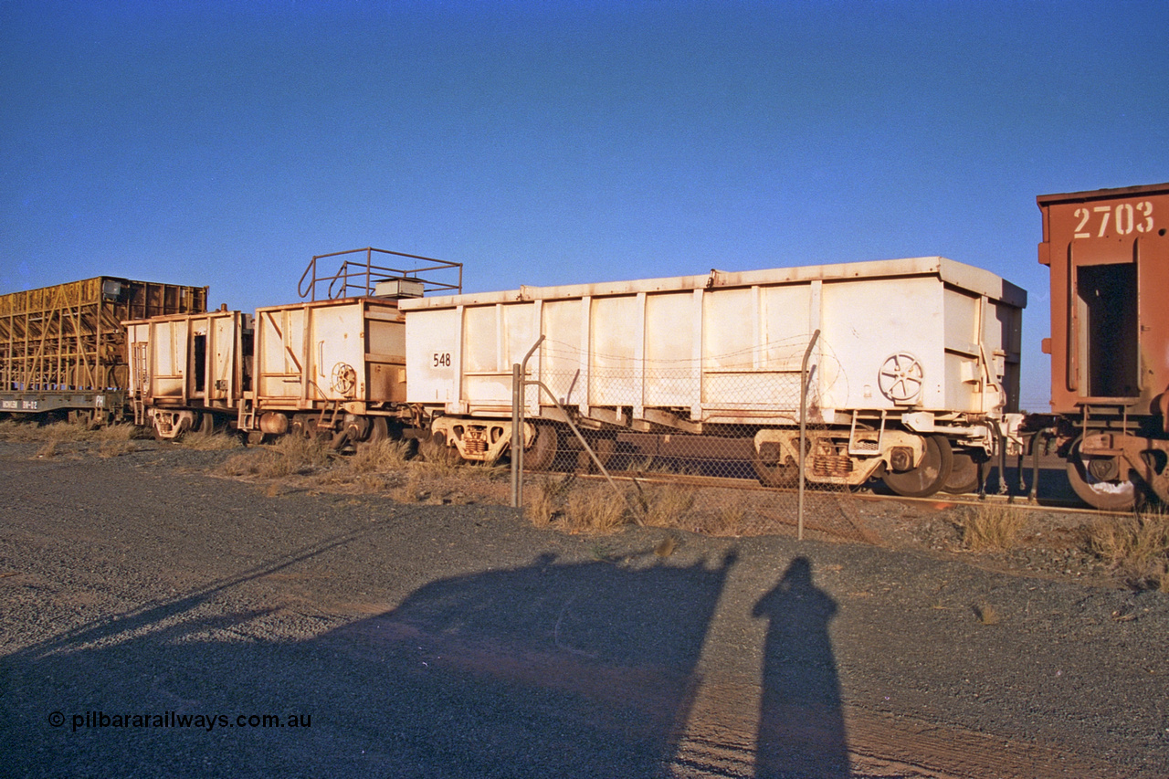 257-21
Flash Butt yard, compressor set #5. Modified Magor USA built ore waggons to form the compressor set, used during the unloading process. Late 2001.
Keywords: Magor-USA;BHP-compressor-waggon;