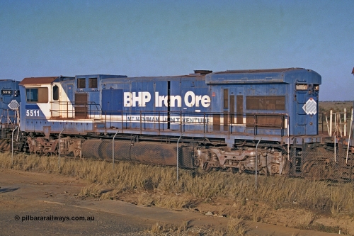 257-02
Flash Butt yard BHP's stored Goninan WA ALCo C636 to GE C36-7M rebuild unit 5511 awaits its fate. Rebuilt in 1987 at Goninan's Welshpool factory from a 1970 AE Goodwin built ALCo C636 with serial number G6035-4 and road number 5463 and assigned new serial number 4839-08 / 87-076. It was delivered in Mount Newman Mining orange and was named Port Hedland. Late 2001.
Keywords: 5511;Goninan;GE;C36-7M;4839-08/87-076;rebuild;AE-Goodwin;ALCo;C636;5463;G6035-4;