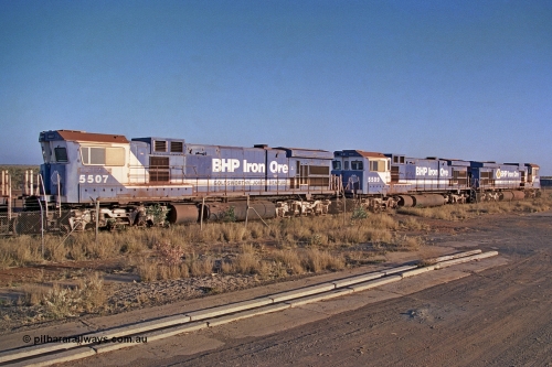 257-03
Flash Butt yard BHP's stored Goninan WA ALCo C636 to GE C36-7M rebuild unit 5507 awaits its fate. Rebuilt in 1987 at Goninan's Welshpool factory from a 1970 AE Goodwin built ALCo C636 with serial number G6035-2 and road number 5461 and assigned new serial number 4839-03 / 87-072. It was delivered in Mount Newman Mining orange and was named Port Hedland. Late 2001.
Keywords: 5507;Goninan;GE;C36-7M;4839-03/87-072;rebuild;AE-Goodwin;ALCo;C636;5461;G6035-2;