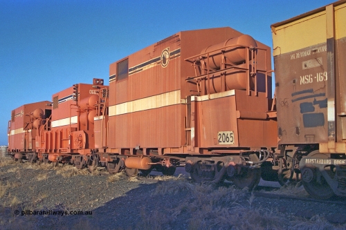 257-14
Flash Butt yard, Locotrol I remote waggon 2065 which is modified from a Comeng ore waggon in the 1980s, Locotrol II remote waggon 661 modified from a Magor USA ore waggon in the late 1980s and Locotrol I remote waggon 2626 modified Comeng ore waggon in the 1980s. Late 2001.
