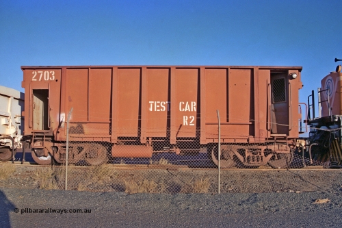 257-17
Flash Butt yard, view of Rail Dynamics Laboratory test waggon 2703 - Test Car R2, modified by BHP from waggon number 2716 in 1975, originally a Comeng built waggon dating from 1971. Late 2001.
Keywords: Comeng-WA;BHP-Comeng-Ore-Waggon;BHP-Service-Waggon;
