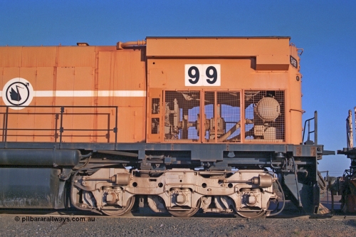 257-19
Flash Butt yard bogie and radiator fan drive view of Mount Newman Mining's last in-service ALCo M636 unit 5499 serial C6096-4 built by Comeng NSW awaits its fate. Late 2001.
Keywords: 5499;Comeng-NSW;MLW-ALCo;M636;C6096-4