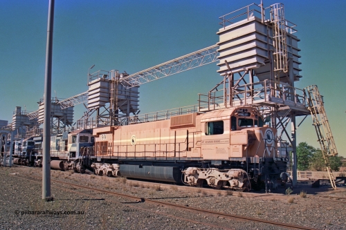 258-24
Nelson Point, old Loco Prep, Mt Newman Mining's last in-service ALCo M636 unit 5499 serial C6096-4 built by Comeng NSW sits awaiting partial dismantling before being sent by road to Rail Heritage WA's museum at Bassendean, Perth for preservation. Behind it are C36-7M units 5506 and 5510, both of which went to Asset Kinetics. May 2002.
Keywords: 5499;Comeng-NSW;MLW-ALCo;M636;C6096-4;