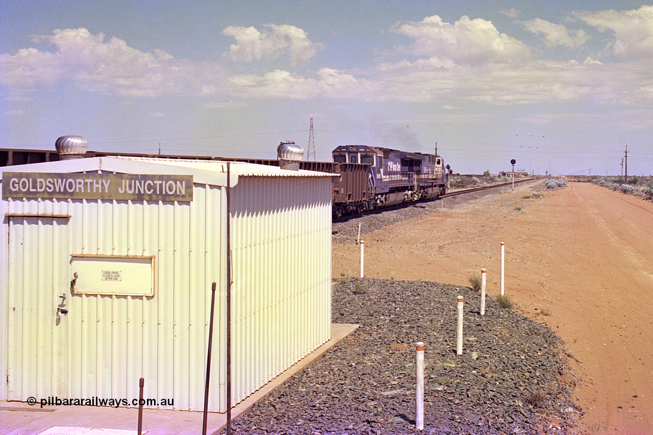 267-09
Goldsworthy Junction, BHP's 1230 empty departure with second unit the last GE rebuild CM40-8MEFI 5669 'Beilun' serial number 8412-02 / 95-160 with General Electric AC6000 unit 6076 on the point with two CM40-8M mid-train units and 208 waggons powers along the Newman mainline. 1247 hrs 12th of April 2002.
Keywords: 5669;Goninan;GE;CM40-8EFI;8412-02/95-160;rebuild;Comeng-NSW;ALCo;M636C;5486;C6084-2;