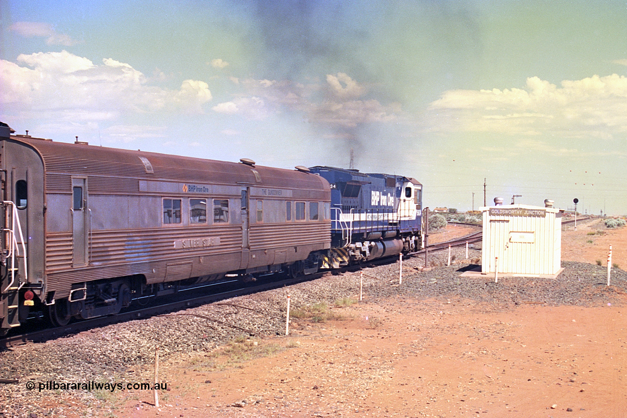 267-22
Goldsworthy Junction, CM40-8M GE rebuild unit 5634 'Boodarie' serial number 8151-07 / 91-120 turns on the power as it passes Goldsworthy Junction relay room and continues along the Newman Mainline with the Sundowner and sister unit 5653. The realigned former Goldsworthy line to the Yarrie and Nimingarra mines can be seen curving away to the left in front of 5634. Friday 12th of April 2002.
Keywords: 5634;Goninan;GE;CM40-8M;8151-07/91-120;rebuild;AE-Goodwin;ALCo;C636;5457;G6027-1;