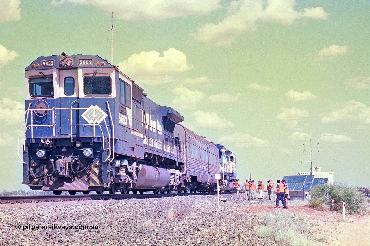 268-13
At the 39 km detection site with the Alstom 25-year service agreement special, BHP Iron Ore's Goninan GE rebuild CM40-8M unit 5653 'Chiba' serial number 8412-10 / 93-144 stands on the Newman mainline with The Sundowner and 5634 on the rear of the train as the party conducts an inspection of the site. Friday 12th of April 2002.
Keywords: 5653;Goninan;GE;CM40-8M;8412-10/93-144;rebuild;AE-Goodwin;ALCo;M636C;5484;G6061-5;