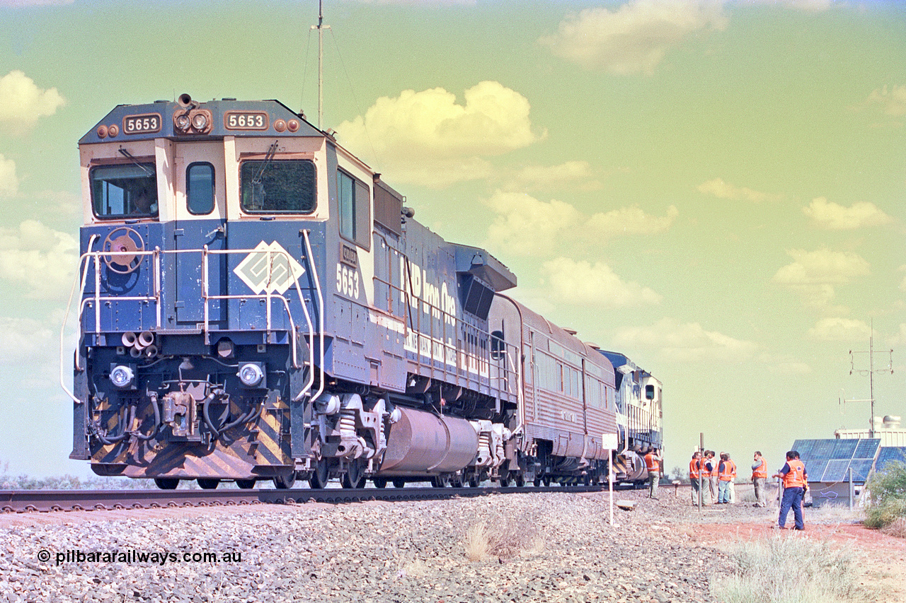 268-14
At the 39 km detection site with the Alstom 25-year service agreement special, BHP Iron Ore's Goninan GE rebuild CM40-8M unit 5653 'Chiba' serial number 8412-10 / 93-144 stands on the Newman mainline with The Sundowner and 5634 on the rear of the train as the party conducts an inspection of the site. Friday 12th of April 2002.
Keywords: 5653;Goninan;GE;CM40-8M;8412-10/93-144;rebuild;AE-Goodwin;ALCo;M636C;5484;G6061-5;