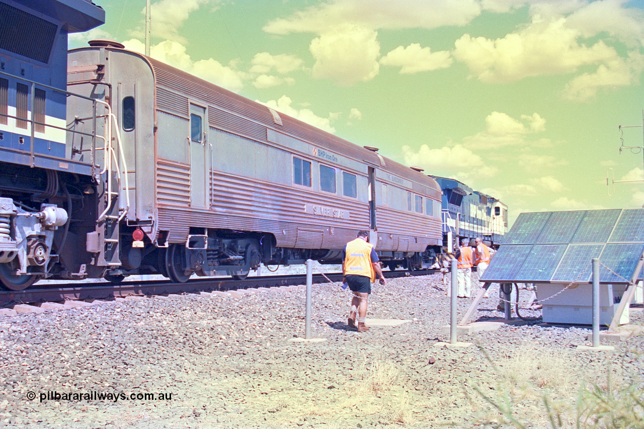 268-23
At the 39 km detection site with the Alstom 25-year special, the Sundowner coach, originally built by E. G. Budd in 1939 numbered 301 as the Silver Star, a diner-parlour-observation coach on the Chicago, Burlington and Quincy Railroad's General Pershing Zephyr train from the 1930s and 1940s. Donated to Mt Newman Mining Co. by AMAX an original joint venture partner to commemorate the projects first 100 million tonnes of iron ore railed between Mount Whaleback mine and the Port Hedland port. 12th of April 2002.
Keywords: Silver-Star;EG-Budd;Sundowner;General-Pershing-Zephyr;301;