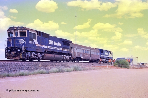 268-02
At the 39 km detection site with the Alstom 25-year service agreement special, BHP Iron Ore's Goninan GE rebuild CM40-8M unit 5653 'Chiba' serial number 8412-10 / 93-144 stands on the Newman mainline with The Sundowner and 5634 on the rear of the train as the party conducts an inspection of the site. Friday April 12, 2002.
Keywords: 5653;Goninan;GE;CM40-8M;8412-10/93-144;rebuild;AE-Goodwin;ALCo;M636C;5484;G6061-5;