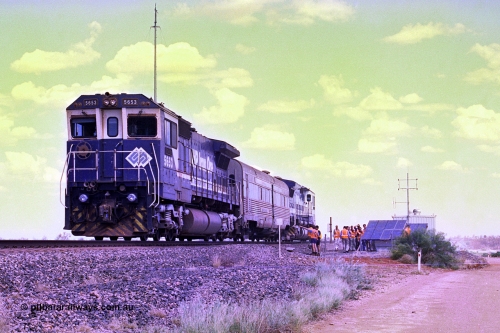268-04
At the 39 km detection site with the Alstom 25-year service agreement special, BHP Iron Ore's Goninan GE rebuild CM40-8M unit 5653 'Chiba' serial number 8412-10 / 93-144 stands on the Newman mainline with The Sundowner and 5634 on the rear of the train as the party conducts an inspection of the site. Friday April 12, 2002.
Keywords: 5653;Goninan;GE;CM40-8M;8412-10/93-144;rebuild;AE-Goodwin;ALCo;M636C;5484;G6061-5;