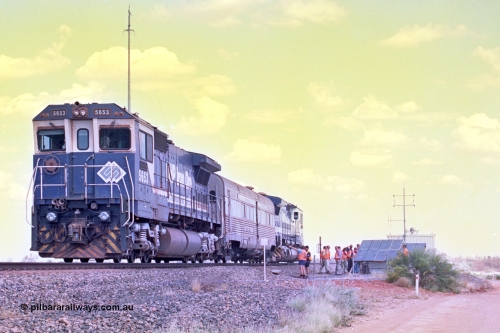 268-05
At the 39 km detection site with the Alstom 25-year service agreement special, BHP Iron Ore's Goninan GE rebuild CM40-8M unit 5653 'Chiba' serial number 8412-10 / 93-144 stands on the Newman mainline with The Sundowner and 5634 on the rear of the train as the party conducts an inspection of the site. Friday April 12, 2002.
Keywords: 5653;Goninan;GE;CM40-8M;8412-10/93-144;rebuild;AE-Goodwin;ALCo;M636C;5484;G6061-5;