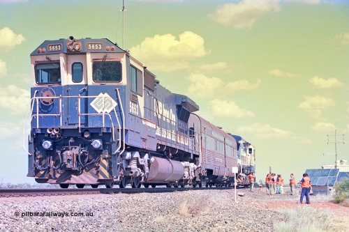 268-14
At the 39 km detection site with the Alstom 25-year service agreement special, BHP Iron Ore's Goninan GE rebuild CM40-8M unit 5653 'Chiba' serial number 8412-10 / 93-144 stands on the Newman mainline with The Sundowner and 5634 on the rear of the train as the party conducts an inspection of the site. Friday April 12, 2002.
Keywords: 5653;Goninan;GE;CM40-8M;8412-10/93-144;rebuild;AE-Goodwin;ALCo;M636C;5484;G6061-5;