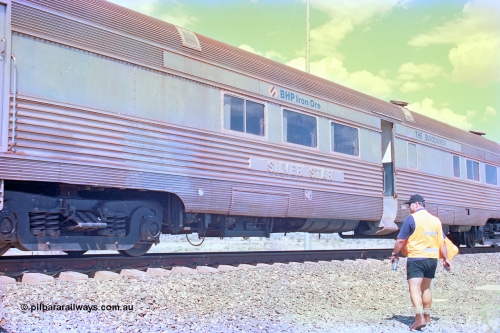 268-22
At the 39 km detection site with the Alstom 25-year special, the Sundowner coach, originally built by E. G. Budd in 1939 numbered 301 as the Silver Star, a diner-parlour-observation coach on the Chicago, Burlington and Quincy Railroad's General Pershing Zephyr train from the 1930s and 1940s. Donated to Mt Newman Mining Co. by AMAX an original joint venture partner to commemorate the projects first 100 million tonnes of iron ore railed between Mount Whaleback mine and the Port Hedland port. April 12, 2002.
Keywords: Silver-Star;EG-Budd;Sundowner;General-Pershing-Zephyr;301;