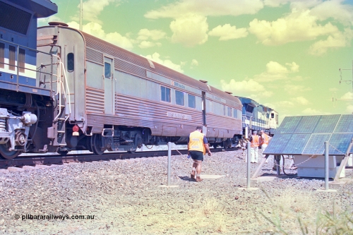 268-23
At the 39 km detection site with the Alstom 25-year special, the Sundowner coach, originally built by E. G. Budd in 1939 numbered 301 as the Silver Star, a diner-parlour-observation coach on the Chicago, Burlington and Quincy Railroad's General Pershing Zephyr train from the 1930s and 1940s. Donated to Mt Newman Mining Co. by AMAX an original joint venture partner to commemorate the projects first 100 million tonnes of iron ore railed between Mount Whaleback mine and the Port Hedland port. April 12, 2002.
Keywords: Silver-Star;EG-Budd;Sundowner;General-Pershing-Zephyr;301;