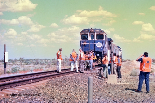 268-26
At the 39 km detection site with the Alstom 25-year service agreement special, BHP Iron Ore's Goninan GE rebuild CM40-8M unit 5653 'Chiba' serial number 8412-10 / 93-144 stands on the Newman mainline with The Sundowner and 5634 on the rear of the train as the party conducts an inspection of the site. Friday April 12, 2002.
Keywords: 5653;Goninan;GE;CM40-8M;8412-10/93-144;rebuild;AE-Goodwin;ALCo;M636C;5484;G6061-5;