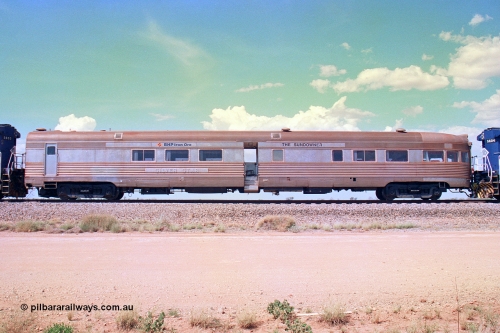 268-29
At the 39 km detection site with the Alstom 25-year special, left hand side view of the Sundowner coach, originally built by E. G. Budd in 1939 numbered 301 as the Silver Star, a diner-parlour-observation coach on the Chicago, Burlington and Quincy Railroad's General Pershing Zephyr train from the 1930s and 1940s. Donated to Mt Newman Mining Co. by AMAX an original joint venture partner to commemorate the projects first 100 million tonnes of iron ore railed between Mount Whaleback mine and the Port Hedland port. April 12, 2002.
Keywords: Silver-Star;EG-Budd;Sundowner;General-Pershing-Zephyr;301;