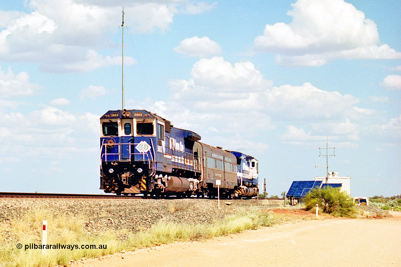 269-09
At the 39 km detection site with the Alstom 25-year service agreement special, BHP Iron Ore's Goninan GE rebuild CM40-8M unit 5653 'Chiba' serial number 8412-10 / 93-144 heads back to Nelson Point with The Sundowner and 5634 on the rear of the train. Friday 12th of April 2002.
Keywords: 5653;Goninan;GE;CM40-8M;8412-10/93-144;rebuild;AE-Goodwin;ALCo;M636C;5484;G6061-5;