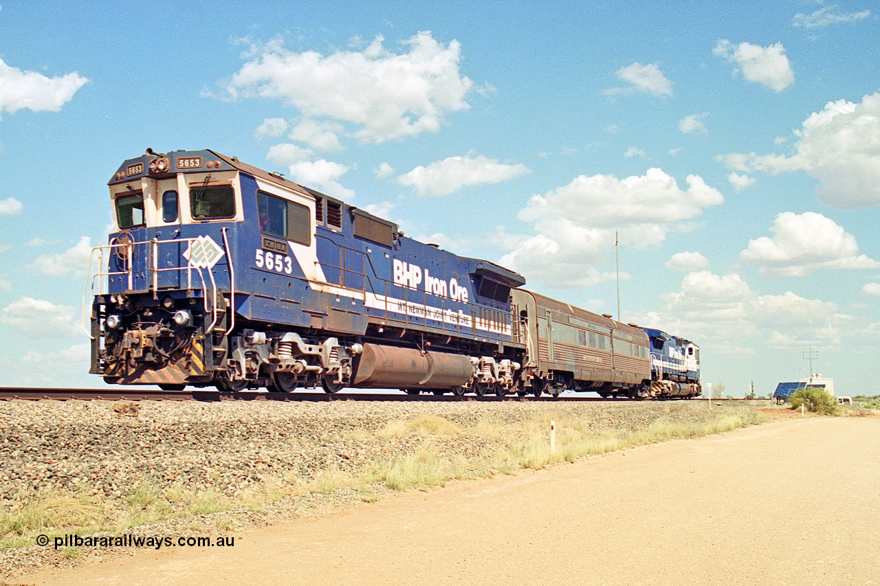 269-13
At the 39 km detection site with the Alstom 25-year service agreement special, BHP Iron Ore's Goninan GE rebuild CM40-8M unit 5653 'Chiba' serial number 8412-10 / 93-144 heads back to Nelson Point with The Sundowner and 5634 on the rear of the train. Friday 12th of April 2002.
Keywords: 5653;Goninan;GE;CM40-8M;8412-10/93-144;rebuild;AE-Goodwin;ALCo;M636C;5484;G6061-5;